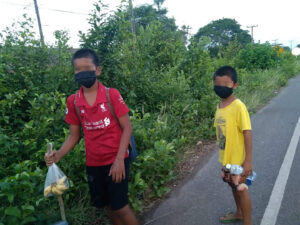 Two young northeastern Thai boys stopped trying to walk 1,450 kilometers to Phuket to visit their cousin