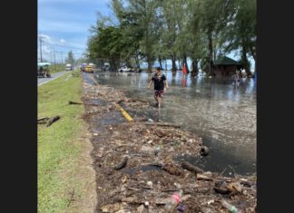 Phuket Governor follows-up on sea water flooding roads in Mai Khao