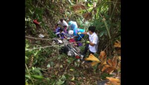 Two people injured after their motorbike falls down from a local road on Patong Hill
