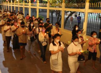 Buddhists in Phuket join candle ceremonies for Asahna Bucha, religious holidays continue