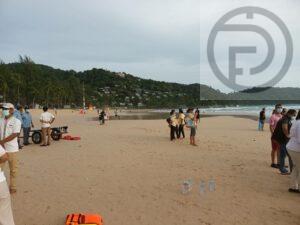 Two foreign tourists rescued after battling with waves at Kata Beach