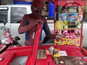 Phuket man wearing Spiderman costume brings delight selling ice-cream