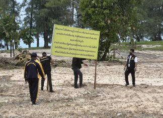 Officials remove encroaching signs on Lay Phang Beach in Thalang