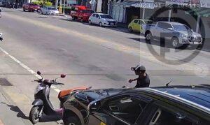 Phuket Taxi Driver Charged After Kicking a Motorbike in Patong