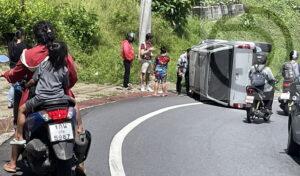 Driver and Young Son Escape Serious injury After Car Overturns on Patong Hill