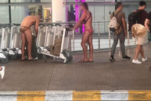 Phuket Airport Clarifies Over Viral Picture of Foreigners Wearing Swimwear