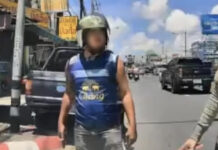 Un chauffeur de taxi menacé par un motocycliste lors d'un conflit autour du tunnel de Phuket