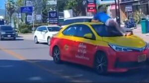 Cherng Talay Police Arrest Drunk Irish Man for Climbing on Taxi