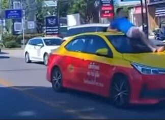 Cherng Talay Police Arrest Drunk Irish Man for Climbing on Taxi